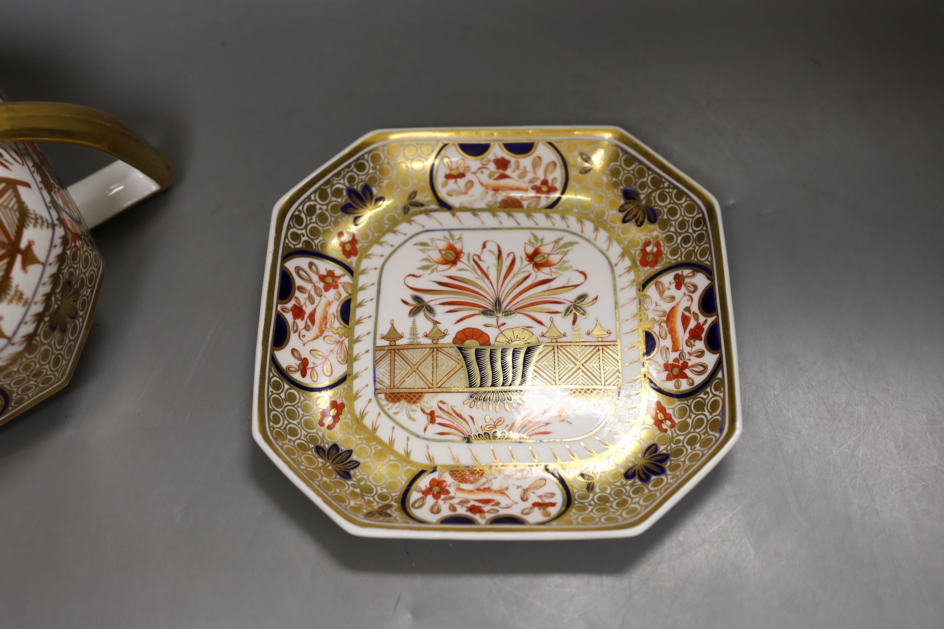 A Spode teapot cover and stand painted with Imari pattern, 1495, c.1820, 24.5 cm long
